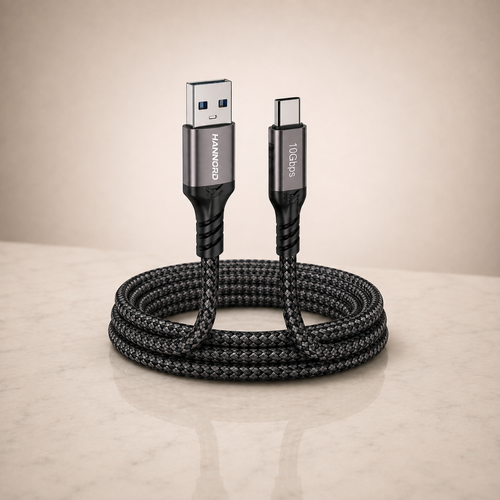 Cable USB-A a USB-C trenzado de carga rápida 60W sobre mármol claro